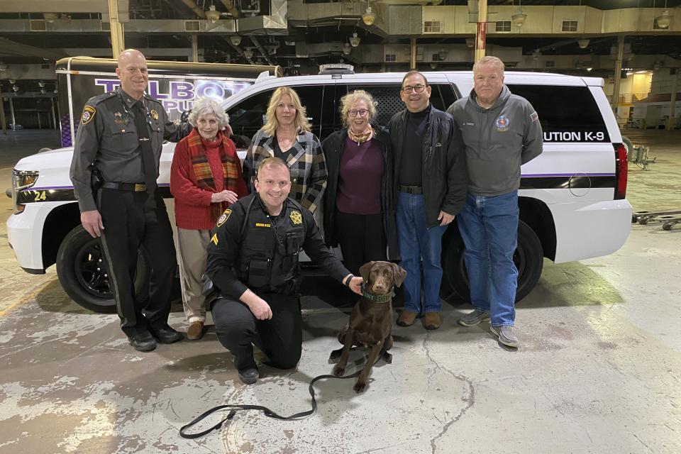 Photographed are Sheriff Joe Gamble, Hope Leuchter, Daphne Forte, Summer Parrish,  Lee Fantone, Ed Forte and Cpl. Mixon with his new K-9 partner, Kiwi.