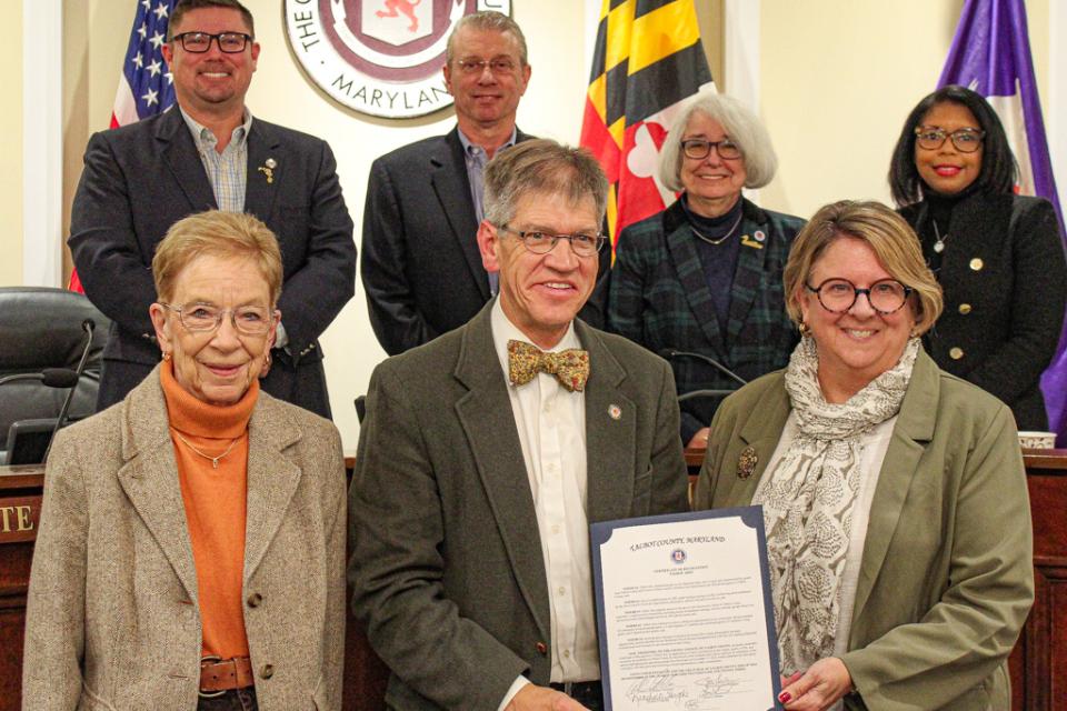 Council Vice President Pete Lesher, extends an Certificate of Recognition for Talbot Arts to President Amy Steward (right) and former President Nancy Larson (left)
