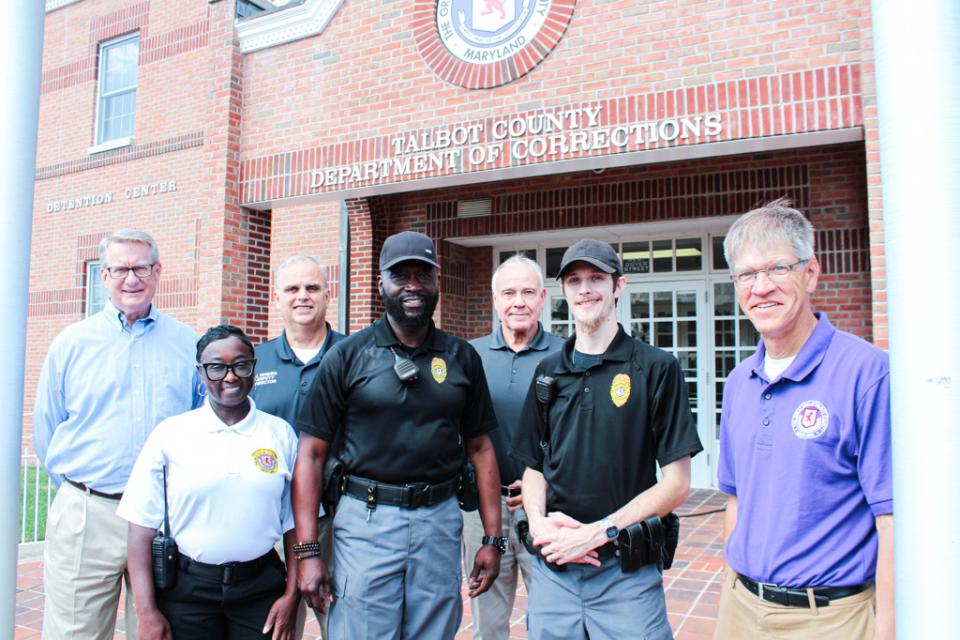 Department of Corrections. From left: County Manager Clay Stamp, Cap. Cindy Green, Deputy Director Joe Hughes, Lamont Murray (10 yrs), Director Terry Kokolis, Thomas Waite (5 yrs), Council Vice President Pete Lesher