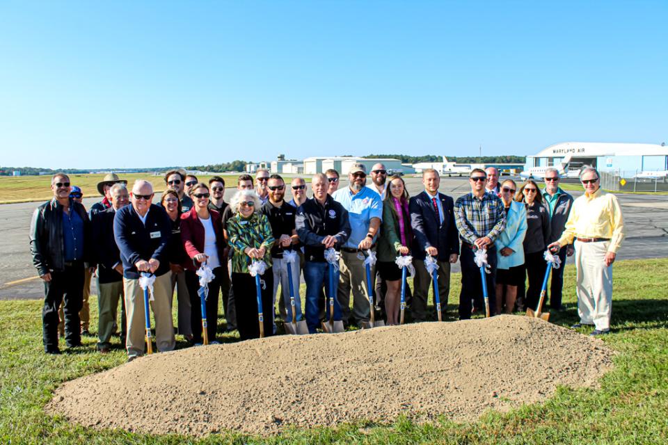 Federal, state, and local delegation members stand with Easton Airport Staff and partners at the Groundbreaking Ceremony for the Airfield Modernization Program.