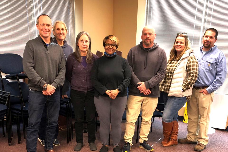 Pictured from left to right are Talbot County resource parents Dan Zollinhofer, Sue Zollinhofer, Frances Seymour, Sharon Caldwell, Brian Flaherty, Sarah Baynard, and Bryan Baynard who participated in a training on car seat safety and infant massage.
