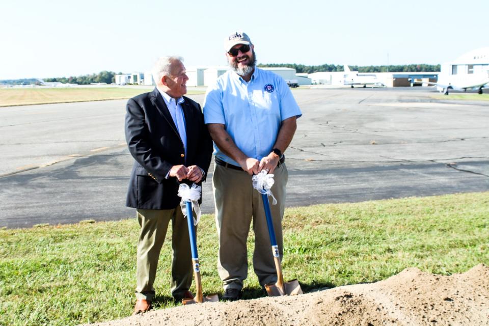 Former Easton Airport Manager Mike Henry reflects on the groundbreaking with Micah Risher, current Manager of the Airport.