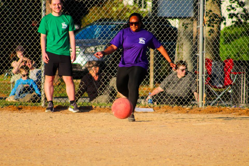 Brandi Nichols, a Talbot County employee, takes a kick for the Talbot County Royals during Shore Social Kickball. The team, made up of County employees, was created as part of the County's Health and Wellness Benefits program.